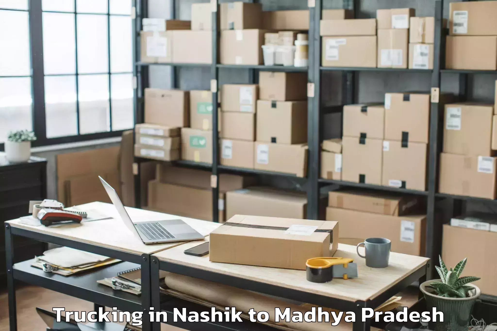 Leading Nashik to Gautampura Trucking Provider